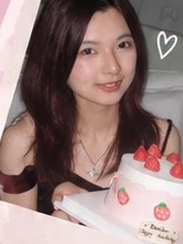 Beaker holding a strawberry birthday cake